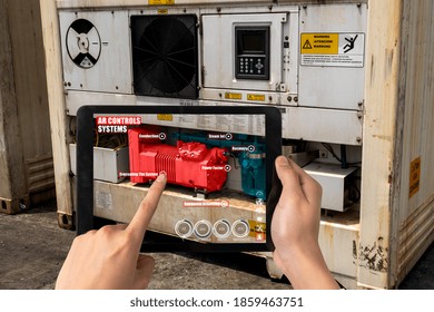 Engineer use augmented reality software in smart factory production line with automated application . Futuristic machinery in working in concept of Industry 4.0 or 4th industrial revolution.