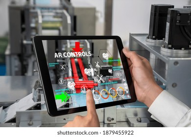 Engineer Use Augmented Reality Software In Smart Factory Production Line With Automated Application . Futuristic Machinery In Working In Concept Of Industry 4.0 Or 4th Industrial Revolution.