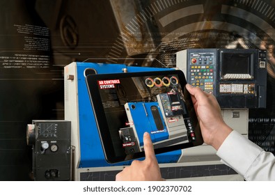 Engineer use augmented reality software in smart factory production line with automated application . Futuristic machinery in working in concept of Industry 4.0 or 4th industrial revolution.