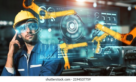Engineer use cybernated robotic software to control industry robot arm in factory . Automation manufacturing process controlled by specialist using IOT software connected to internet network . - Shutterstock ID 2194537759