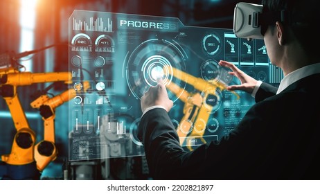 Engineer use cybernated robotic software to control industry robot arm in factory . Automation manufacturing process controlled by specialist using IOT software connected to internet network . - Shutterstock ID 2202821897