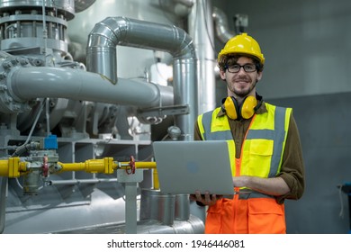 Engineer Use Laptop Computer Checking And Inspection Of HVAC Heating Ventilation Air Conditioning System On Pressure Gauge Of Industrial Air Compressor Boiler Pump Room System. 