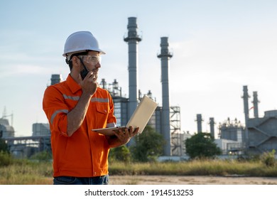 Engineer use radio communication working at refinery industry,Concept to professional engineer on industrial. - Shutterstock ID 1914513253