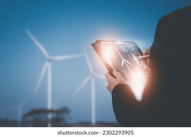 engineer use smart tablet,control power generation alternative wind turbine,clean energy concept smart cities sustainability environmental protection Order artificial intelligence technology