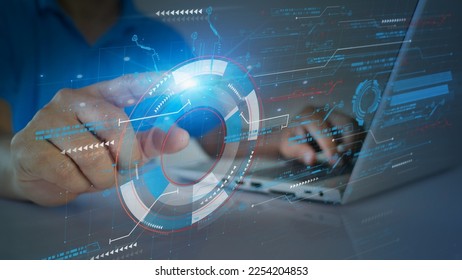 Engineer using Artificial Intelligence AI to collect data analytic for industrial management and visualizing the data through HUD Holograms display. Industrial management and future technology concept