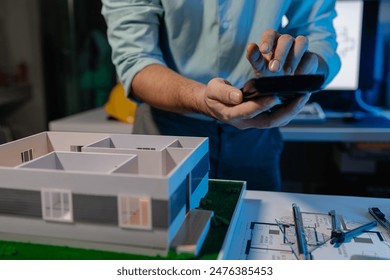 an engineer is using calculator to find the correct numbers for construction, the architect calculates the distance between each room and the height of each floor of the building