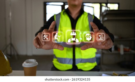 Engineer using futuristic interface for project planning and management at a construction site