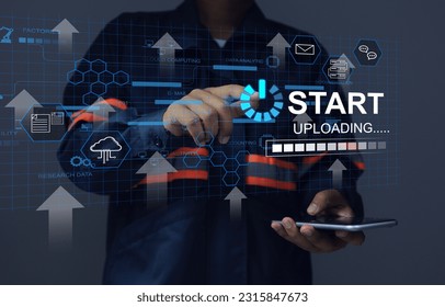 Engineer using hand to press start uploading button to send data to cloud computing or digital transformation to connect data online access data anywhere. Big data and information technology