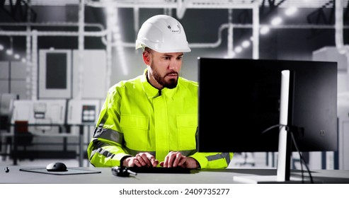 Engineer Using PC In Automated Semiconductor Assembly Line - Powered by Shutterstock