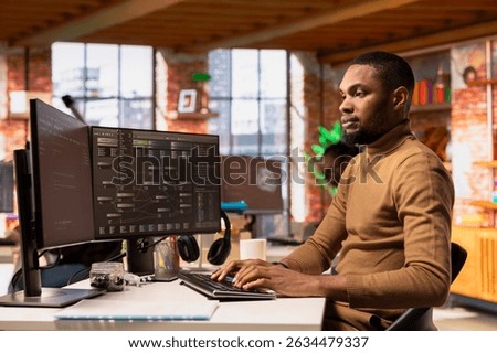 IT engineer using PC in innovative startup office and programming languages to build applications. Software development agency worker debugging and optimizing code on computer