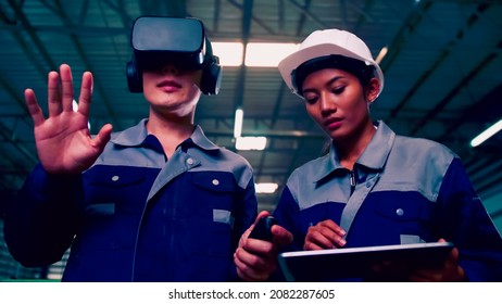 Engineer Is Using Virtual Reality Glasses To Inspect The Factory's Mechanical Control System.