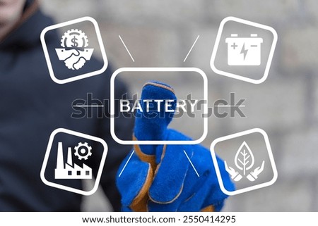 Engineer using virtual touch screen presses word: BATTERY. Electric car lithium battery automated assembly line. Batteries and accumulators innovative industry production.