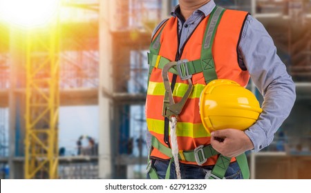 engineer wear fall arrest equipment on site  background - Shutterstock ID 627912329
