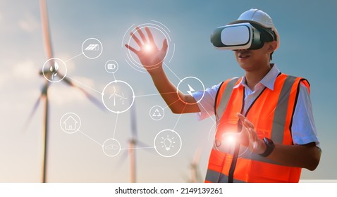 Engineer Wearing VR Technology Simulation Control Inspecting Wind Turbine Power Energy Levels Check Up Statistics With Graphical Icon Control, Eco Environmentally Friendly Sustainable Power Resources