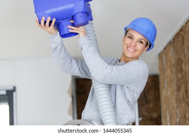 Engineer Woman During Ventilation Ceiling