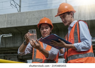  Engineer , Worker Checking Waste Water On Plant. Worker Working On Waste Water Treatment Plant.