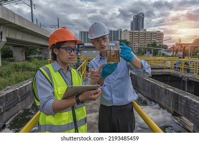  Engineer , Worker Checking Waste Water On Plant. Worker Working On Waste Water Treatment Plant.