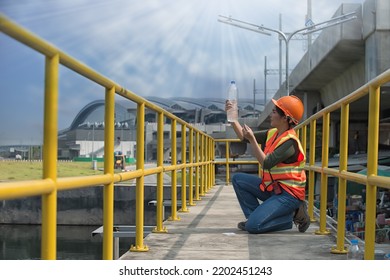 Engineer , Worker Checking Waste Water On Plant. Worker Working On Waste Water Treatment Plant.