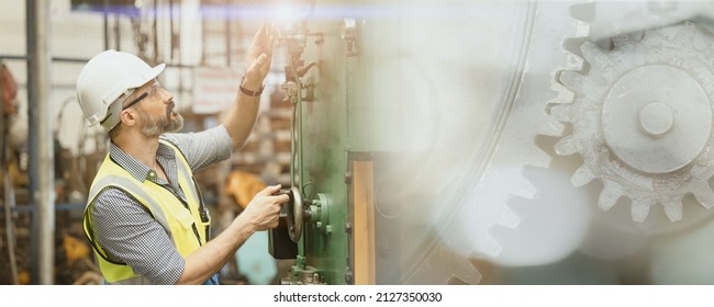 Engineer Worker Man Working In Heavy Industry. Male Staff With Safety Suit Maintenance Check Factory Machine Overlay With Metal Gear.image Wide Banner Size.