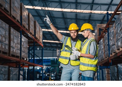 engineer or worker person team working in factory warehouse, man, manufacturing industry business distribution storage by teamwork of logistic occupation job, woman or man manager work with safety - Powered by Shutterstock