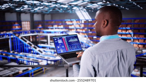 Engineer Worker Using Warehouse Automation Dashboard In Logistic Center