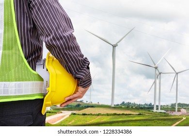 Engineer Worker At Wind Turbine Power Station Construction Site