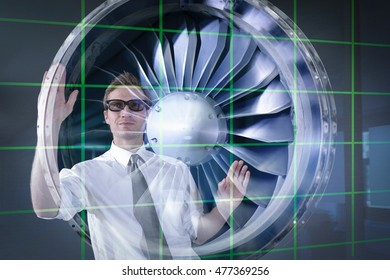 Engineer working with 3D display of Jet Engine, seen through interactive display