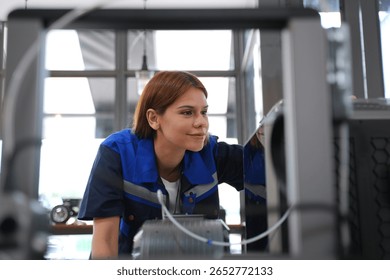 Engineer is working at 3D printing workshop. Engineering, technology.