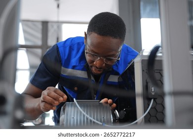 Engineer is working at 3D printing workshop. Engineering, technology.