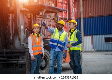 Engineer working and checking a quality of containers box from cargo ship for export and import,Container Shipping Logistics Engineering concept.