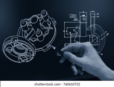 Engineer Working At Computer On Mechanical Piece Design   