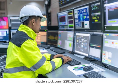 Engineer working at control room,Manager control system,Technician man monitoring program from a lot of monitor - Shutterstock ID 2281397237