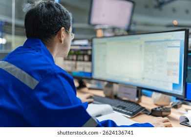 Engineer working at control room,Manager control system,Technician man monitoring program from a lot of monitor