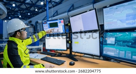 Engineer working at control room,Manager control system,Technician man monitoring program from a lot of monitor