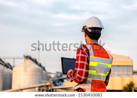 Engineer are working contruction on site plans to build high-rise buildings. Engineer building concept.