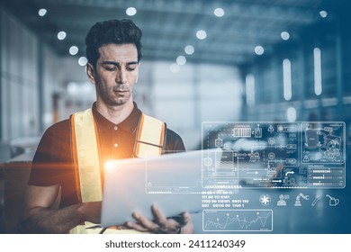 Engineer working with laptop computer for modern digital computing technology for advance engineering factory operation information data concept