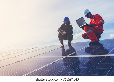 engineer working on checking equipment in solar power plant 
