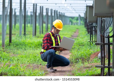 Engineer working on checking and maintenance equipment in solar power plant,Clean energy concept.