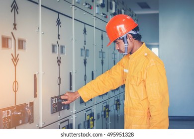 engineer working on checking and maintenance equipment : Switchgear controller to transmission line