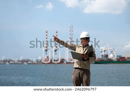 Engineer are working on container shipping port at night.