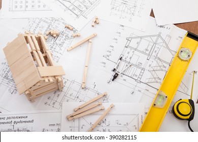 Engineer working on drawings, concept of building house