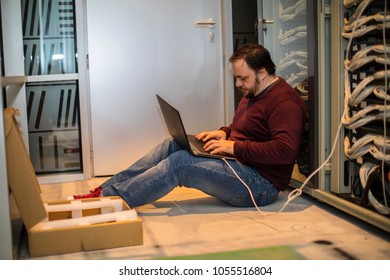 Engineer working in server room