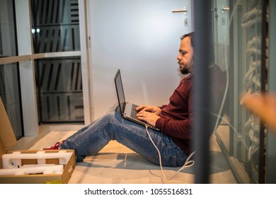 Engineer working in server room