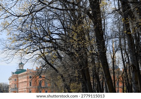 Engineering castle across the Moika River with a beautiful embankment on a sunny May morning, Russia, St.Petersburg