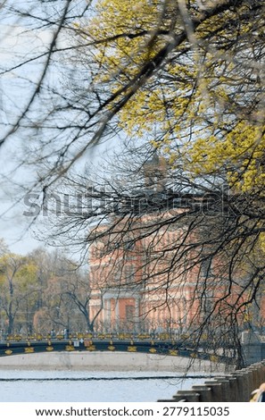 Engineering castle across the Moika River with a beautiful embankment on a sunny May morning, Russia, St.Petersburg