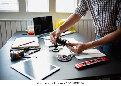 Engineering Is Checking The Metal Wheel For Future Car Assembly.