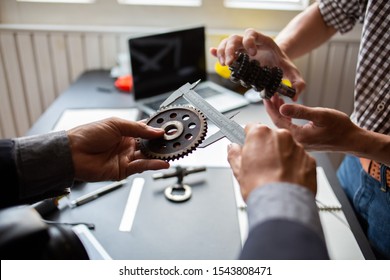 Engineering Is Checking The Metal Wheel For Future Car Assembly.