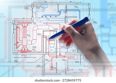 Engineering design, HVAC planning. Engineer marks ventilation and piping layout on technical blueprint, develops building systems, coordinates airflow, heating, and cooling solutions.