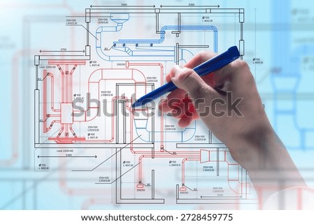 Engineering design, HVAC planning. Engineer marks ventilation and piping layout on technical blueprint, develops building systems, coordinates airflow, heating, and cooling solutions.