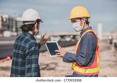 Engineering Holding Tablet Work On Road Construction